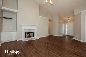 Union City house for rent - the living room and dining room with fireplace
