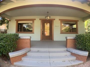 Santa Barbara apartment for rent - the front porch of a house with steps and a door