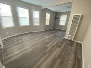 Colton apartment for rent - an empty living room with a hard wood floor