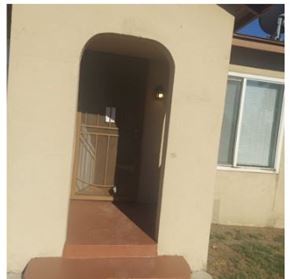 San Bernardino apartment for rent - an open doorway of a house with a porch