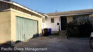 San Diego house for rent - A building with a Pacific Shore Management sign in front.