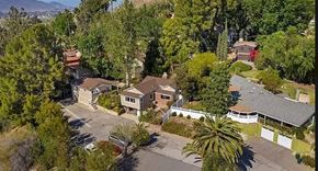 Riverside apartment for rent - an aerial view of a neighborhood with houses and trees
