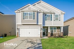 Charlotte house for rent - A two-story house with a garage is for sale by FirstKey Homes.