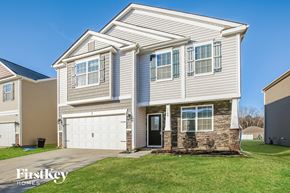 Charlotte house for rent - A two-story house with a garage is for sale by FirstKey Homes.