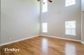 Ladson house for rent - a living room with wood floors and a ceiling fan