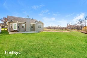St Peters house for rent - a small house with a yard and a grassy field