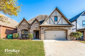Trussville house for rent - two story home with brick and stone exterior and a garage