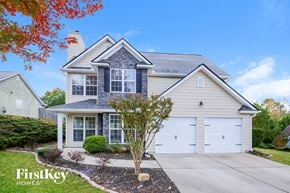 Dawsonville house for rent - a white house with a white garage door