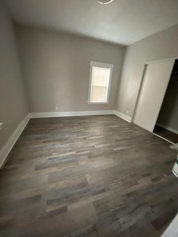 Colton apartment for rent - the living room of a house with wooden floors