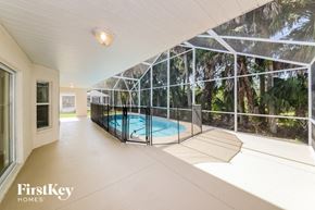 Ellenton house for rent - A pool in a house with FirstKey Homes written on the bottom left.