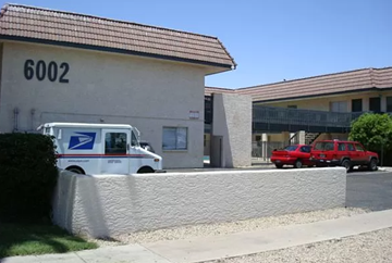 Glendale apartment for rent - a white truck parked in front of a building