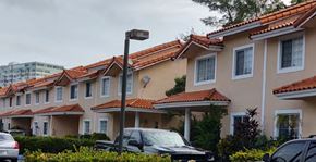 N. Miami apartment for rent - a row of houses with cars parked in front of them
