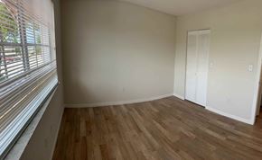N. Miami apartment for rent - a living room with wood floors and a large window