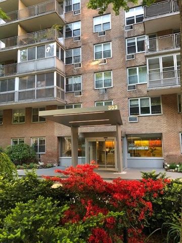 New York apartment for rent - A building with the number 303 on it.