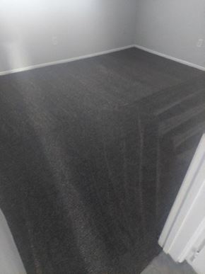 San Bernardino apartment for rent - the floor of a room with a gray carpet