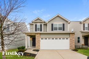 Lake St Louis house for rent - A house with a garage door that says "Firstkey" on it.