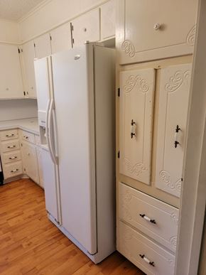 Temple house for rent - a kitchen with white cabinets and a white refrigerator