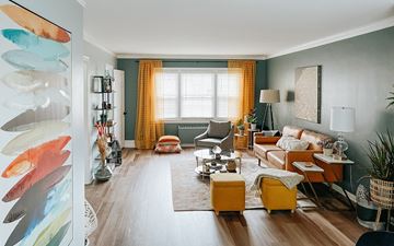 Shaker Heights apartment for rent - a living room filled with furniture and a painting on the wall