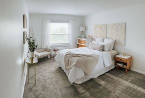 Shaker Heights apartment for rent - a bedroom with a bed and a window