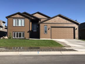 Spokane apartment for rent - a brown house with a brown garage door