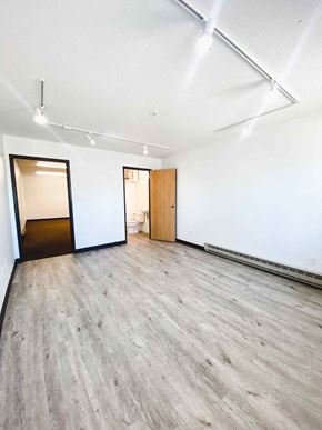 Fargo apartment for rent - an empty room with white walls and wood floors