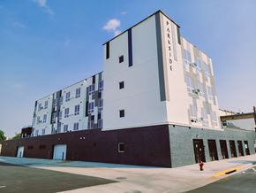 Watertown apartment for rent - A modern building with the words "PARKSIDE" on the side.
