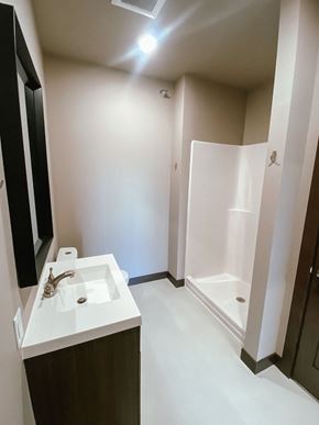 Watertown apartment for rent - A bathroom with a sink and a shower.