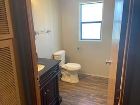 Grandview apartment for rent - A bathroom with a toilet and sink.