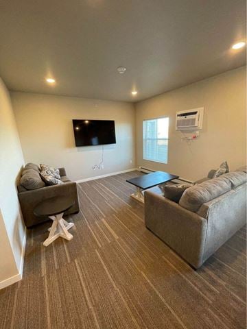 Devils Lake apartment for rent - a living room with two couches and a television