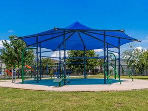 New Orleans apartment for rent - a playground with a blue pavilion with a swing set