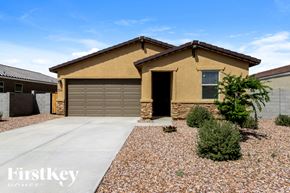 San Tan Valley house for rent - A house with a brown roof and a garage door.