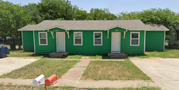 Copperas Cove apartment for rent - A green house with a white door and windows.