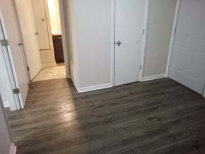 Copperas Cove apartment for rent - a room with wooden floors and white closets