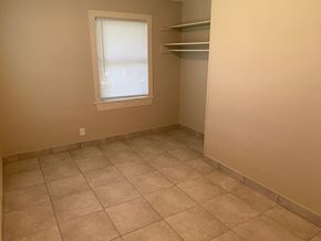 Bay City apartment for rent - an empty room with a closet and a window