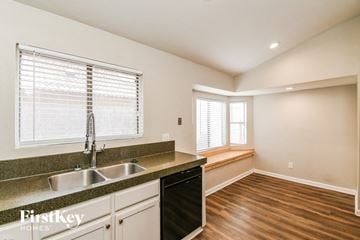 Gilbert house for rent - A kitchen with a sink, dishwasher, and a window with blinds.