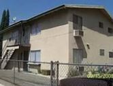 Whittier apartment for rent - A house with a fence in front of it.
