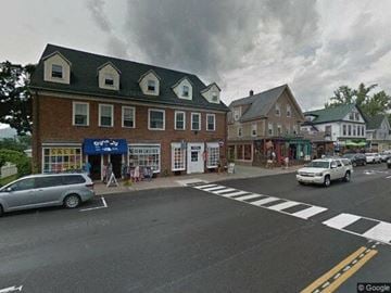 North Conway apartment for rent - a city street with cars parked in front of buildings