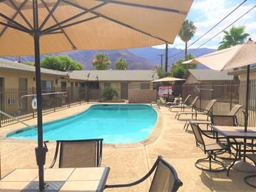 Palm Springs apartment for rent - the swimming pool at our apartments with mountains in the background