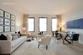 Brooklyn apartment for rent - a living room with a couch and a dining room