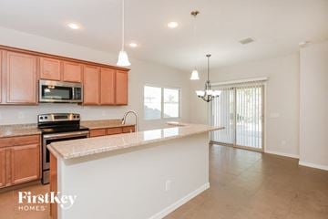 San Tan Valley house for rent - a kitchen with a counter top and a sink