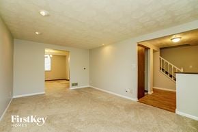 Dublin house for rent - the living room and dining room with the staircase to the second floor