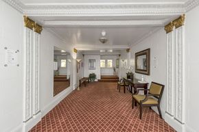 San Francisco apartment for rent - A hallway with a red and white checkered floor.