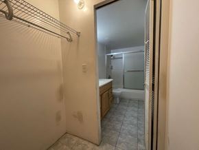 Wahiawa apartment for rent - A bathroom with a walk-in shower and a toilet.