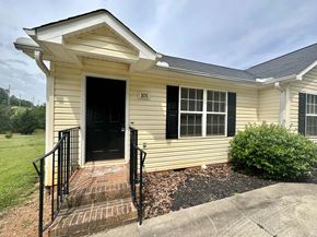 Anderson apartment for rent - A small house with the number 101 on the front door.
