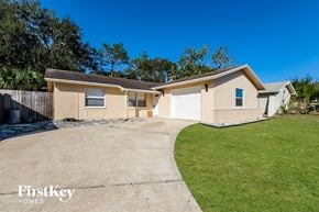 Tarpon Springs house for rent - A two-story house with a garage is for sale.