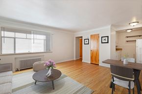 Denver apartment for rent - a living room and dining room with a table and chairs