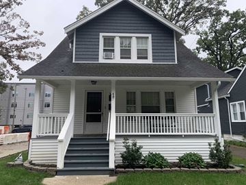 Ferndale apartment for rent - A small house with a porch and a front door.