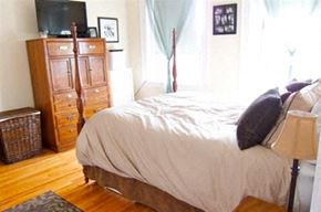 Worcester apartment for rent - a bedroom with a bed and a dresser