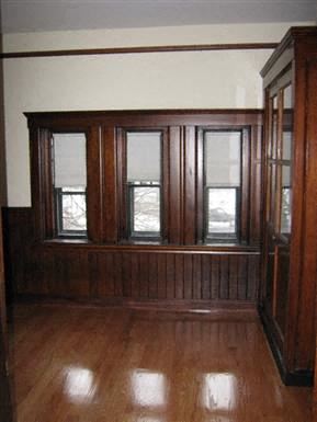 Worcester apartment for rent - a living room with wood floors and windows