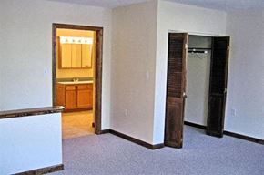 Northborough apartment for rent - an empty living room with a door to a bathroom